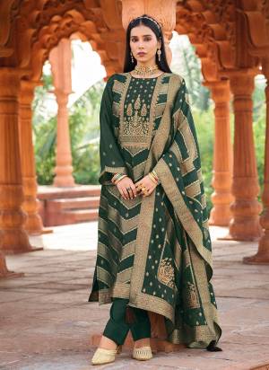 Garb These Party Wear Salwar Suit in Fine Colored Pair With Bottom And Dupatta.These Top Are Banglori Silk And Dupatta Are Fabricated On Banglori Silk Pair With Santoon Bottom.Its Beautified With Heavy Woven Jacquard Designer.