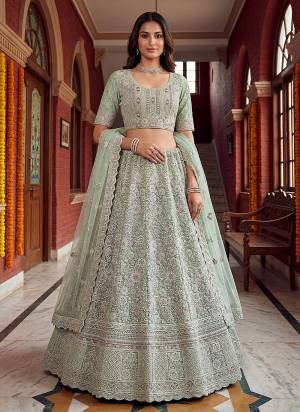 For A Fancy Designer Look,Grab These Lehenga Choli With Dupatta in Fine Colored.These Lehenga And Choli Are Net And Dupatta Are Fabricated On Soft Net Pair.Its Beautified With Fancy Chapat Jari,Sequance,Multy Thread,Dori Embroidery,Zircon Diamond Work. 