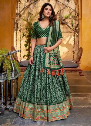 Looking These Party Wear Lehenga Choli in Fine Colored. These Lehenga And Blouse Are Tassar Silk And Dupatta Are Fabricated On Tassar Silk Fabriced. It is Beautified With Designer Sparkle Printed.