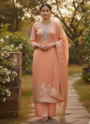 Looking These Disigner Suit in Fine Colored Pair With Bottom And Dupatta.These Top Are Dani Cotton And Dupatta Are Fabricated On Cotton Jacquaed Pair With Santoon Bottom.Its Beautified With Woven Designer With Embroidery Work.