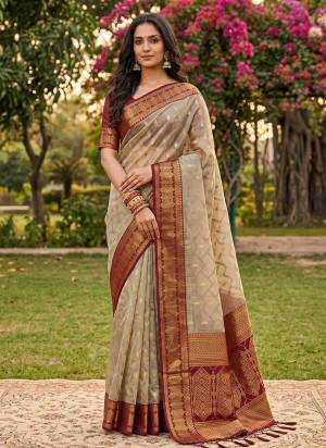 Looking These Fastive And Party Wear Saree in Fine Colored.These Saree And Blouse is Fabricated On Cotton.Its Beautified With Woven Jari Designer.