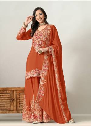 Looking These Party Wear Designer Sharara Suits in Fine Colored Pair With Dupatta.These Top Are Chinon And Dupatta Are Fabricated On Chinon Pair With Chinon Bottom.Its Beautified With Heavy Designer Embroidery Work.