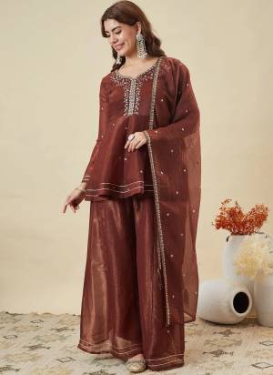 Looking These Suit in Fine Colored Pair With Bottom And Dupatta.These Top Are Crunchy Silk And Bottom Are Fabricated On Crunchy Silk Pair With Crunchy Silk Dupatta.Its Beautified With Designer Embroidery Work.