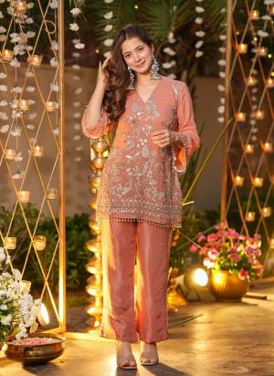 Looking These Suit in Fine Colored Pair With Bottom.These Top Are Crunchy Silk And Bottom Are Fabricated On Crunchy Silk.Its Beautified With Designer Embroidery Work.
