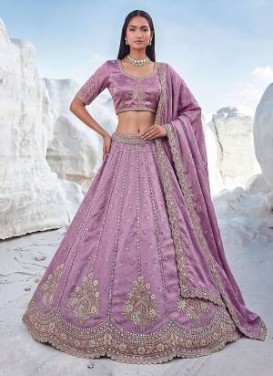 For A Fancy Designer Look,Grab These Lehenga Choli With Dupatta in Fine Colored.These Lehenga And Choli Are Silk And Dupatta Are Fabricated On Silk Pair.Its Beautified With Fancy Heavy Jari,Sequance Embroidery Work. 