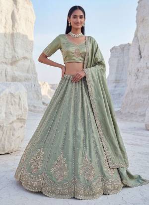 For A Fancy Designer Look,Grab These Lehenga Choli With Dupatta in Fine Colored.These Lehenga And Choli Are Silk And Dupatta Are Fabricated On Silk Pair.Its Beautified With Fancy Heavy Jari,Sequance Embroidery Work. 