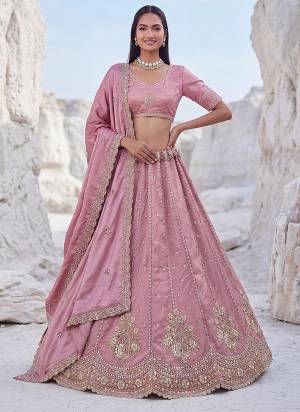 For A Fancy Designer Look,Grab These Lehenga Choli With Dupatta in Fine Colored.These Lehenga And Choli Are Silk And Dupatta Are Fabricated On Silk Pair.Its Beautified With Fancy Heavy Jari,Sequance Embroidery Work. 