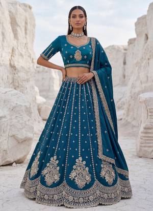 For A Fancy Designer Look,Grab These Lehenga Choli With Dupatta in Fine Colored.These Lehenga And Choli Are Silk And Dupatta Are Fabricated On Silk Pair.Its Beautified With Fancy Heavy Jari,Sequance Embroidery Work. 