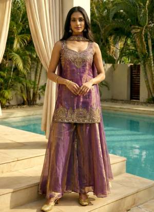 Garb These Suit in Fine Colored Pair With Bottom And Dupatta.These Top Are Fendy Satin And Bottom Are Fabricated On Fendy Satin Pair With Fendy Satin Dupatta.Its Beautified With Designer Beads Embroidery Work.