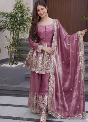 Garb These Suit in Fine Colored Pair With Bottom And Dupatta.These Top Are Fendy Silk And Bottom Are Fabricated On Fendy Silk Pair With Fendy Silk Dupatta.Its Beautified With Designer Embroidery Work.