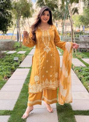 Garb These Suit in Fine Colored Pair With Bottom And Dupatta.These Top Are Roman Silk And Bottom Are Fabricated On Roman Silk Pair With Kota Chex Dupatta.Its Beautified With Designer Embroidery Work.