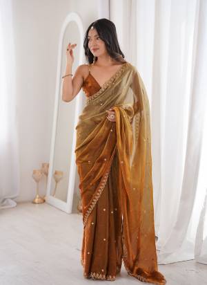 Looking These Party Wear Saree in Fine Pedding Colored.These Saree Are Fendy Satin And Blouse is Fendy Satin Fabricated.Its Beautified With Pedding Color With Sequance Embroidery Work.