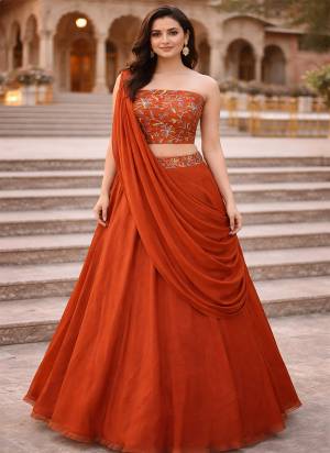 Looking These Party Wear Lehenga Choli in Fine Colored.These Lehenga And Choli Are Rangoli Silk And Dupatta Are Fabricated On Rangoli Silk Pair.Its Beautified With Designer Multy Thread Embroidery Work Blouse.