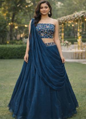 Looking These Party Wear Lehenga Choli in Fine Colored.These Lehenga And Choli Are Rangoli Silk And Dupatta Are Fabricated On Rangoli Silk Pair.Its Beautified With Designer Multy Thread Embroidery Work Blouse.