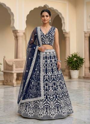 Looking These Party Wear Lehenga Choli in Fine Colored.These Lehenga And Choli Are Net And Dupatta Are Fabricated On Net Pair.Its Beautified With Designer Embroidery Work.