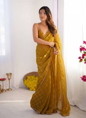 Garb These Fancy Party Wear Saree in Fine Colored.These Saree Are NC Chiffon Chex And Blouse is NC Chiffon Chex Fabricated.Its Beautified With Woven Chex Designer With Cut Dana Lace Border.