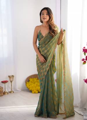 Garb These Fancy Party Wear Saree in Fine Colored.These Saree Are NC Chiffon Chex And Blouse is NC Chiffon Chex Fabricated.Its Beautified With Woven Chex Designer With Cut Dana Lace Border.