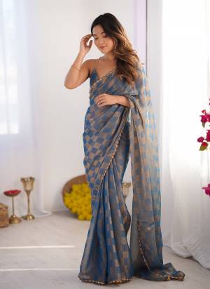 Garb These Fancy Party Wear Saree in Fine Colored.These Saree Are NC Chiffon Chex And Blouse is NC Chiffon Chex Fabricated.Its Beautified With Woven Chex Designer With Cut Dana Lace Border.
