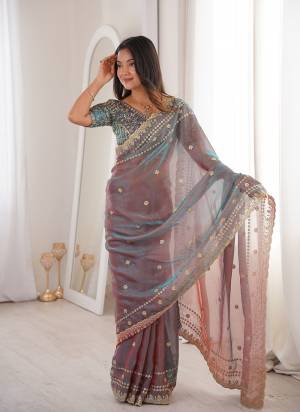 Looking These Fancy Party Wear Saree in Fine Colored.These Saree Are Fendy Satin And Blouse is Fendy Satin Fabricated.Its Beautified With Sequance Embroidery Work.