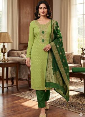 Garb These Disigner Suit in Fine Colored Pair With Bottom And Dupatta.These Top Are Simmer Butti And Dupatta Are Fabricated On Banarasi Pair With Santoon Bottom.Its Beautified With Woven Butti Designer With Embroidery Work.