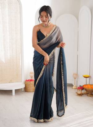 Attractive These Fancy Party Wear Saree in Fine Sheded Colored.These Saree Are Fendy Satin And Blouse is Fendy Satin Fabricated.Its Beautified With Sheded Color With Lace Border Designer.