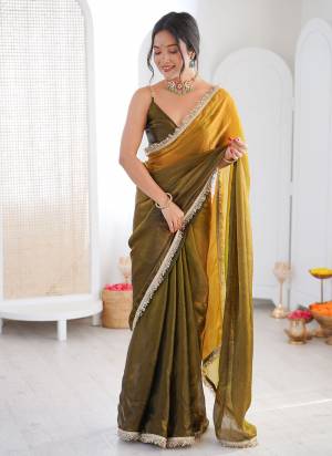 Attractive These Fancy Party Wear Saree in Fine Sheded Colored.These Saree Are Fendy Satin And Blouse is Fendy Satin Fabricated.Its Beautified With Sheded Color With Lace Border Designer.