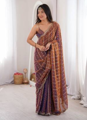 Garb These Fancy Party Wear Saree in Fine Colored.These Saree Are Fendy Satin And Blouse is Fendy Satin Fabricated.Its Beautified With Sequance Embroidery Work.
