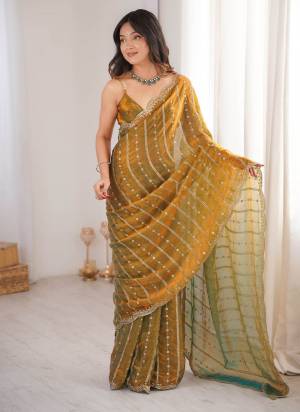 Garb These Fancy Party Wear Saree in Fine Colored.These Saree Are Fendy Satin And Blouse is Fendy Satin Fabricated.Its Beautified With Sequance Embroidery Work.