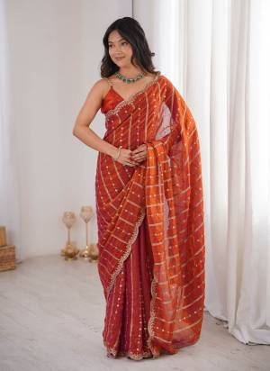 Garb These Fancy Party Wear Saree in Fine Colored.These Saree Are Fendy Satin And Blouse is Fendy Satin Fabricated.Its Beautified With Sequance Embroidery Work.