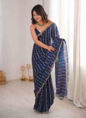 Garb These Fancy Party Wear Saree in Fine Colored.These Saree Are Fendy Satin And Blouse is Fendy Satin Fabricated.Its Beautified With Sequance Embroidery Work.