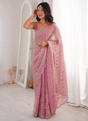 Garb These Fancy Party Wear Saree in Fine Colored.These Saree Are Fendy Satin And Blouse is Fendy Satin Fabricated.Its Beautified With Sequance Embroidery Work.