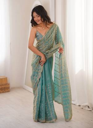 Garb These Fancy Party Wear Saree in Fine Colored.These Saree Are Fendy Satin And Blouse is Fendy Satin Fabricated.Its Beautified With Sequance Embroidery Work.
