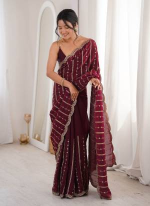 Garb These Fancy Party Wear Saree in Fine Colored.These Saree Are Fendy Satin And Blouse is Fendy Satin Fabricated.Its Beautified With Sequance Embroidery Work.