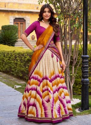 Looking These Party Wear Lehenga Choli in Fine Colored. These Lehenga And Blouse Are Tassar Silk And Dupatta Are Fabricated On Tassar Silk Fabriced. It is Beautified With Designer Tie & Dye Printed.