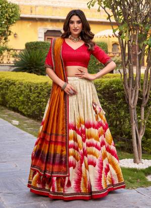 Looking These Party Wear Lehenga Choli in Fine Colored. These Lehenga And Blouse Are Tassar Silk And Dupatta Are Fabricated On Tassar Silk Fabriced. It is Beautified With Designer Tie & Dye Printed.