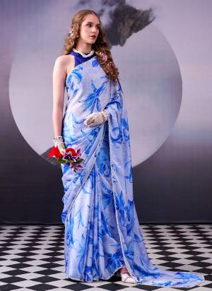 Garb These Festive And Party Wear Saree in Fine Colored.These Saree Are Satin Silk And Blouse is Fabricated On Banglori.Its Beautified With Designer Floral Printed With Pearl Lace Border.