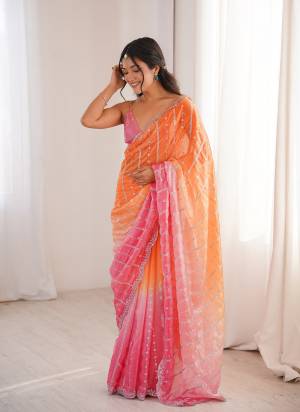 Garb These Fancy Party Wear Saree in Fine Colored.These Saree Are Fendy Satin And Blouse is Fendy Satin Fabricated.Its Beautified With Pedding Color With Sequance Embroidery Work.