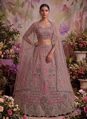 For A Fancy Designer Look,Grab These Lehenga Choli With Dupatta in Fine Colored.These Lehenga And Choli Are Net And Dupatta Are Fabricated On Soft Net Pair.Its Beautified With Fancy Jari,Sequance,Dori,Multy Thread Embroidery Work. 