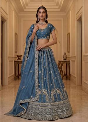 For A Fancy Designer Look,Grab These Lehenga Choli With Dupatta in Fine Colored.These Lehenga And Choli Are Silk And Dupatta Are Fabricated On Silk Pair.Its Beautified With Fancy Jari,Sequance Embroidery,Lace Work. 