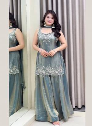 Looking These Suit in Fine Colored Pair With Bottom And Dupatta.These Top Are Fendy Satin And Bottom Are Fabricated On Fendy Satin Pair With Fendy Satin Dupatta.Its Beautified With Designer Embroidery Work.