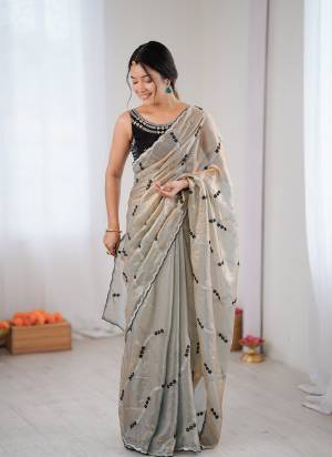 Attractive These Fancy Party Wear Saree in Fine Two Tone Colored.These Saree Are Fendy Satin And Blouse is Fendy Satin Fabricated.Its Beautified With Two Tone Color,Designer Sequance Embroidery Work.