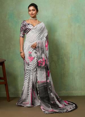 Garb These Fancy Party Wear Saree in Fine Colored.These Saree Are Georgette And Blouse is Georgette Fabricated.Its Beautified With Designer Printed With Sparkel.