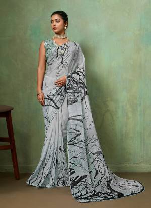Garb These Fancy Party Wear Saree in Fine Colored.These Saree Are Georgette And Blouse is Georgette Fabricated.Its Beautified With Designer Printed With Sparkel.