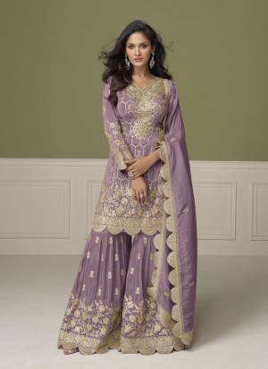 Looking These Party Wear Free Size Stitched Sharara Suit in Fine Colored Pair With Dupatta.These Top And Dupatta Are Simmer And Bottom Are Simmer.Its Beautified With Heavy Designer Embroidery,Hand Work.