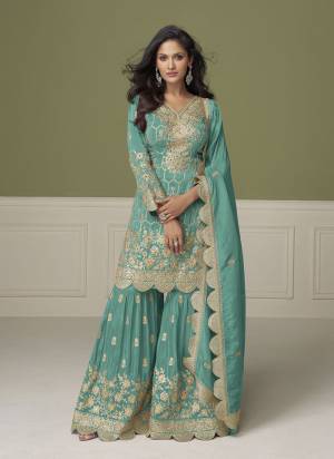 Looking These Party Wear Free Size Stitched Sharara Suit in Fine Colored Pair With Dupatta.These Top And Dupatta Are Simmer And Bottom Are Simmer.Its Beautified With Heavy Designer Embroidery,Hand Work.