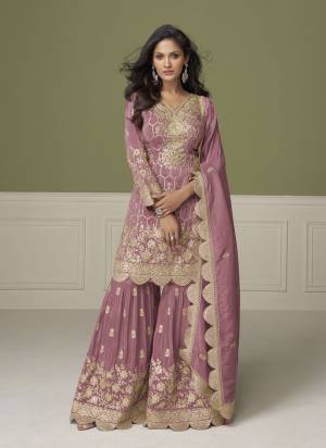 Looking These Party Wear Free Size Stitched Sharara Suit in Fine Colored Pair With Dupatta.These Top And Dupatta Are Simmer And Bottom Are Simmer.Its Beautified With Heavy Designer Embroidery,Hand Work.