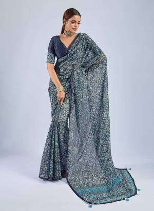 Looking These Fancy Party Wear Saree in Fine Colored.These Saree Are Chiffon And Blouse is Chiffon Fabricated.Its Beautified With Woven Patta Designer, Ajrak Printed,Sequance Work Blouse.
