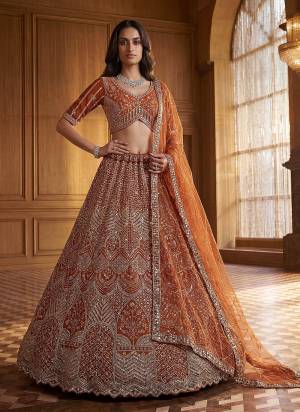 For A Fancy Designer Look,Grab These Lehenga Choli With Dupatta in Fine Colored.These Lehenga And Choli Are Net And Dupatta Are Fabricated On Soft Net Pair.Its Beautified With Fancy Patten,Intricate Boota,Sequance Embroidery,Motif Crystal Work. 