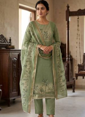 Attractive These Suit in Fine Colored Pair With Bottom And Dupatta.These Top Are Cotton Linen Simmer And Dupatta Are Fabricated On Cotton Linen Simmer Pair With Rayon Bottom.Its Beautified With Designer Printed, Hand Work.