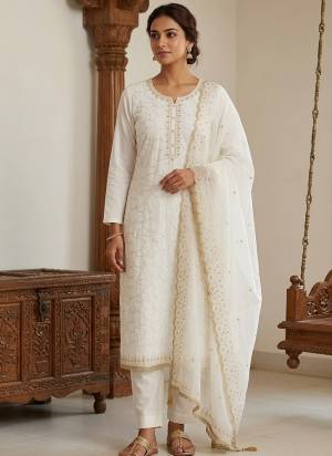 Attractive These Suit in Fine Colored Pair With Bottom And Dupatta.These Top Are Jam Cotton And Dupatta Are Fabricated On Art Silk Pair With Rayon Bottom.Its Beautified With Designer Embroidery, Hand Work.